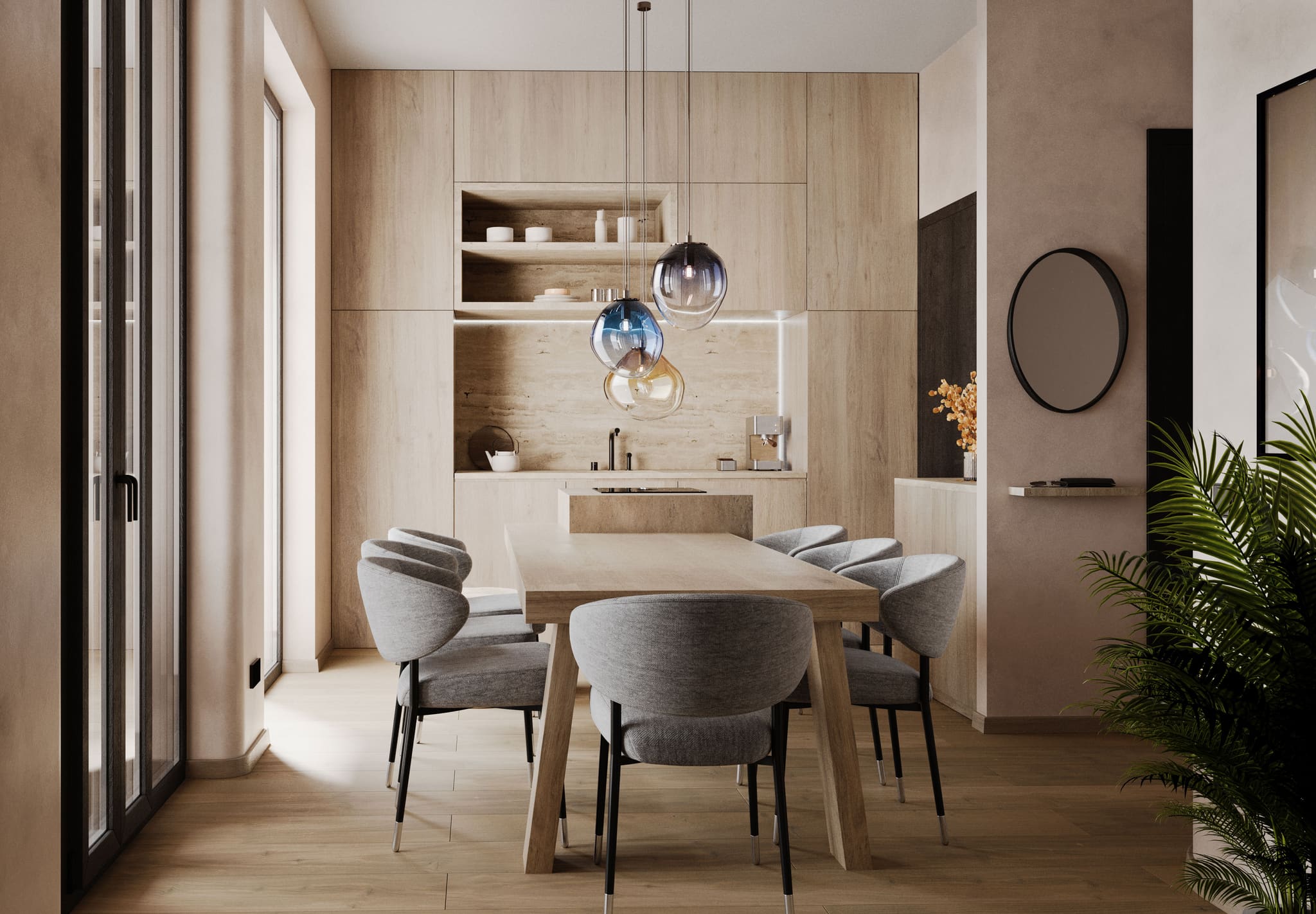 Küche der Maisonette mit Holzfronten, Esstisch und farbigen Glaspendelleuchten