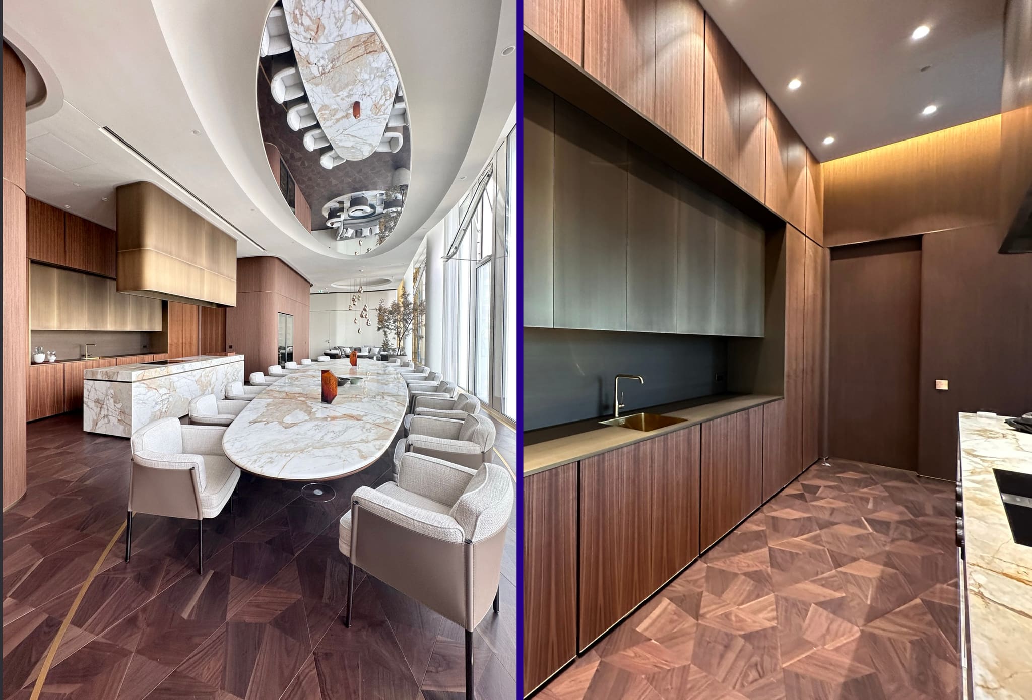 Composite: long oval marble table with pale chairs beneath an oval mirrored ceiling, alongside a walnut kitchen run with a brass tap